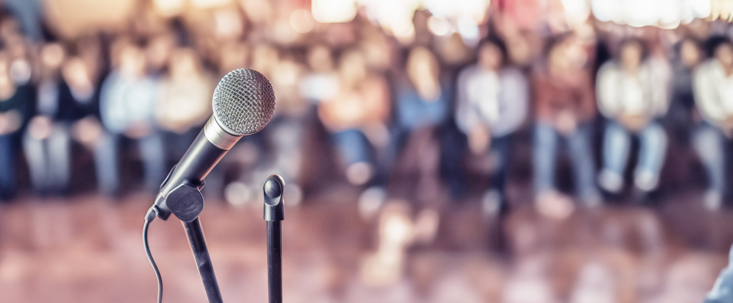 Close Up Of A Microphone In Front Of A Blurred Background Audien